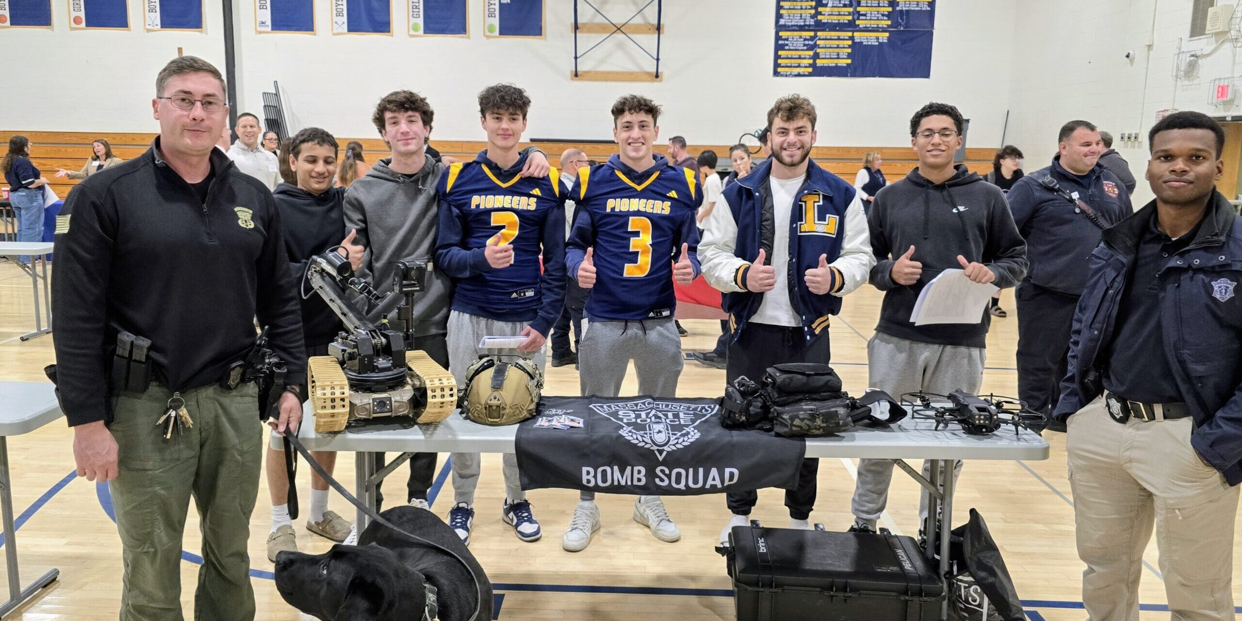 Lynnfield Students pose with Massachusetts State Police Bomb Squad at LHS Career Fair